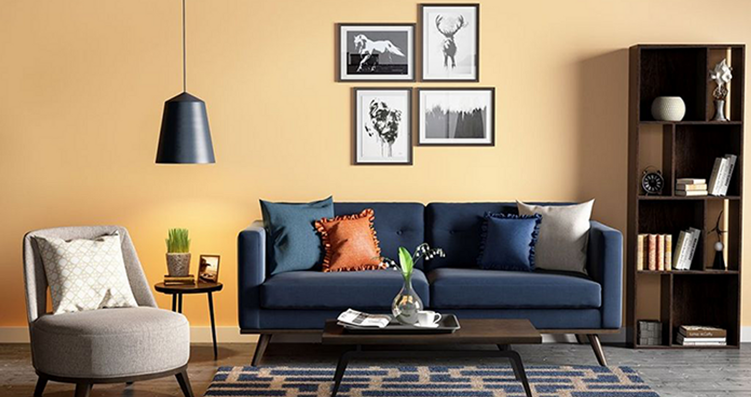 Spacious living room in Lucknow with modern decor and plush seating.